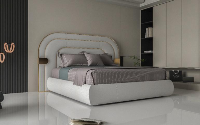 Luxuriöses graues Bett mit goldenen Akzenten im modernen Design und gepolstertem Kopfteil