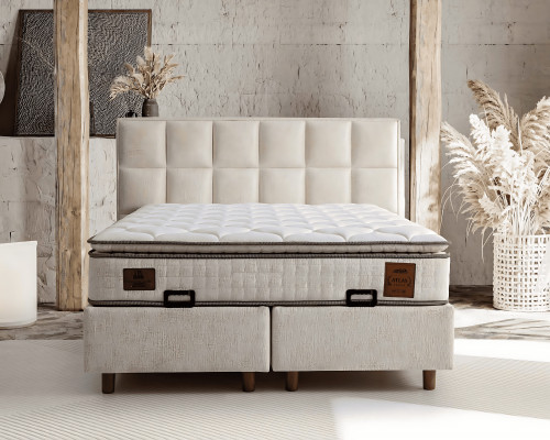 Elegantes Bett mit Matratze aus Textil in Beige