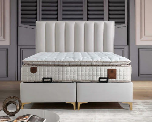 Elegantes Bett mit Matratze aus Textil in Beige