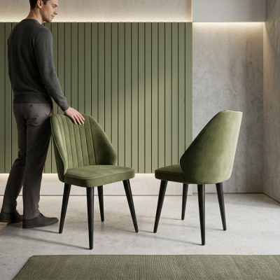 Grüner Stuhl auf schwarzen Holzbeinen für das Esszimmer neu komfortables Modell