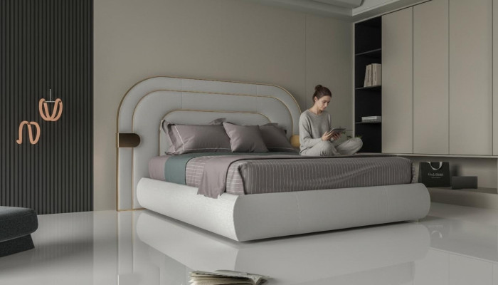Luxuriöses graues Bett mit goldenen Akzenten im modernen Design und gepolstertem Kopfteil