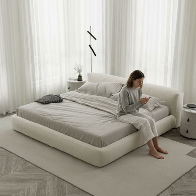 Elegantes graues Polsterbett im modernen Design – luxuriöses Bett
