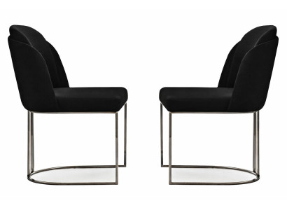 Zwei elegante schwarze Essstühle mit chromfarbener Basis und Design