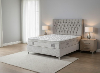 Doppelbett mit ergonomischer Matratze für optimale Nachtruhe