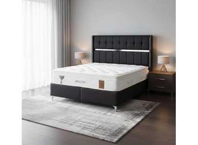 Elegantes Bett mit hochwertigem Kopfteil und robustem Rahmen